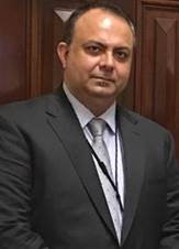 Sarat Sharma, Treasurer and Director